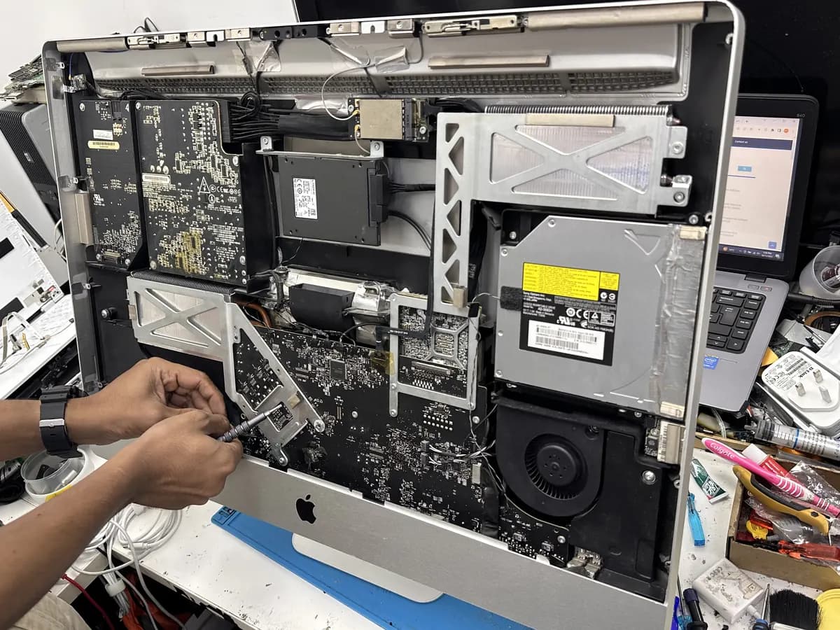 iMac opened on the bench for internal repair