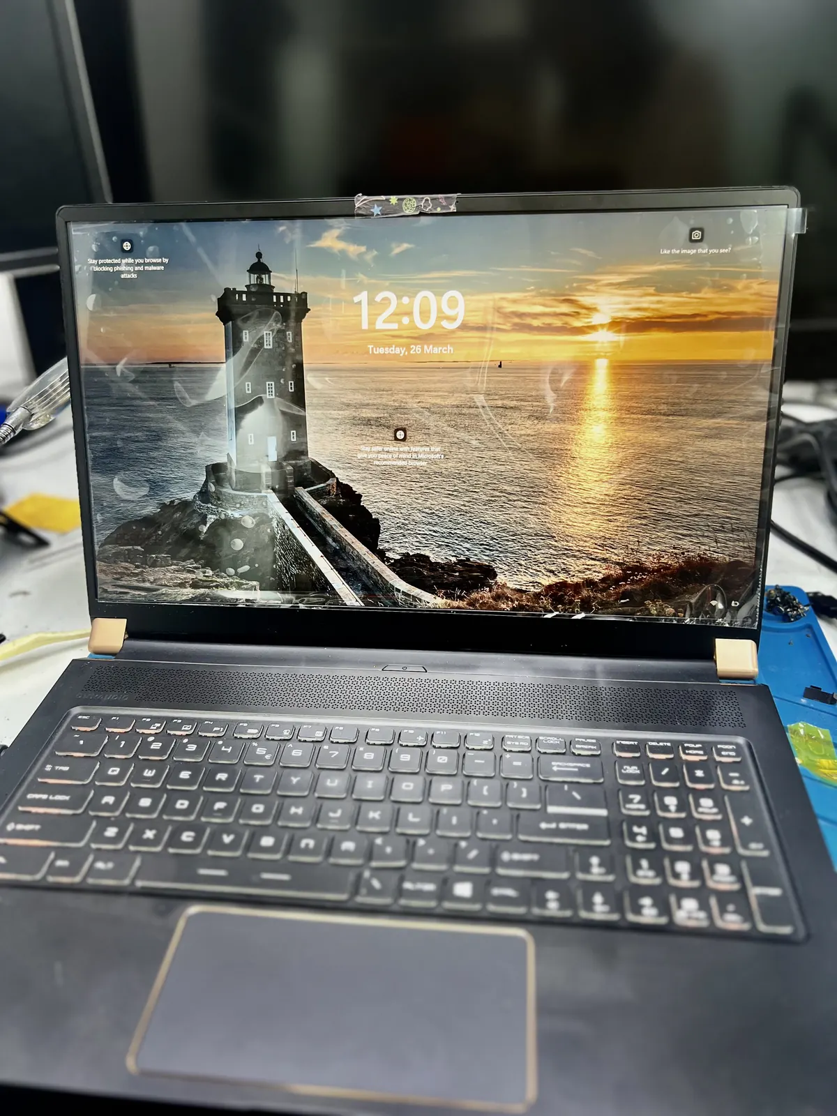 Laptop keyboard being tested after replacement