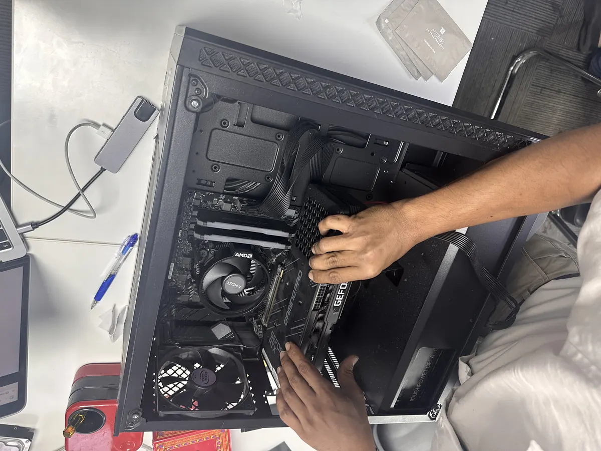 Desktop PC being assembled by a TechFix technician