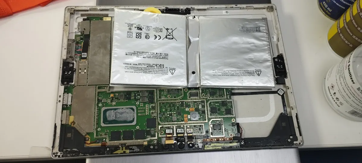 Tablet and laptop internals opened for battery access